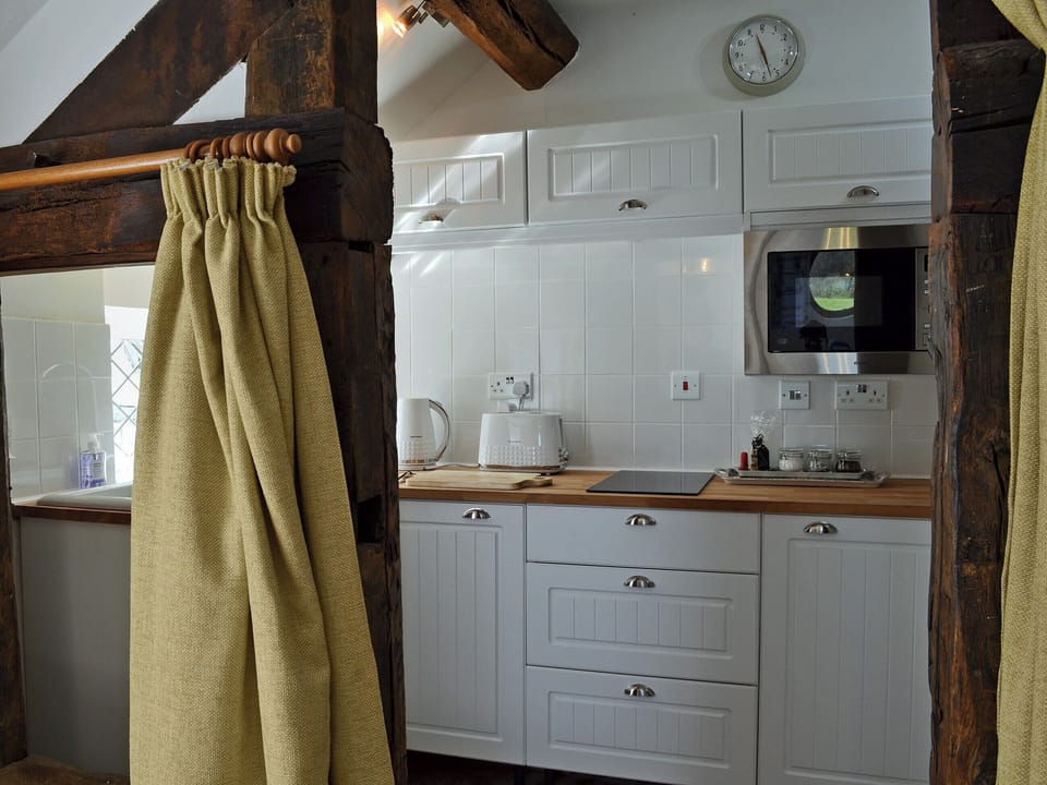 Compact and well-appointed kitchen | The Beehive, Betley, near Nantwich