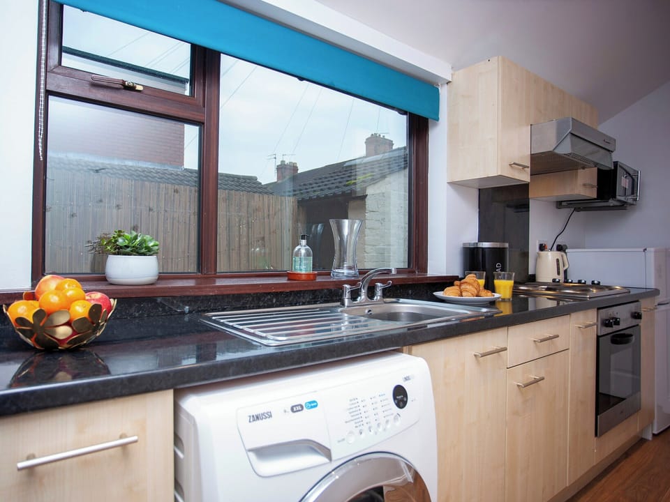Well equipped galley-style kitchen | Freville Cottage, Shildon, near Bishop Auckland