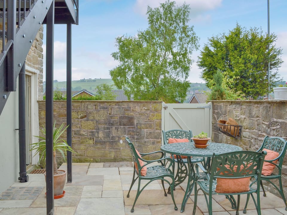 Spacious patio with sitting out area | Alphin Apartment, Mossley