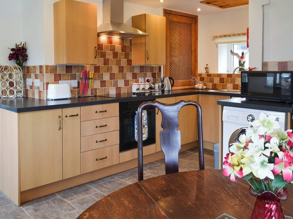 Kitchen with breakfast area | Knotty Corner Cottage, Fairy Cross, near Bideford