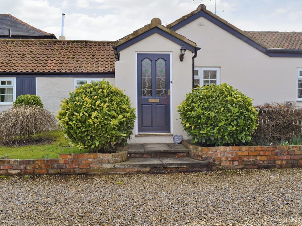Appealing fa&ccedil;ade | Willow Tree Cottage at Cottage Farm - Cottage Farm, Foxholes, near Scarborough