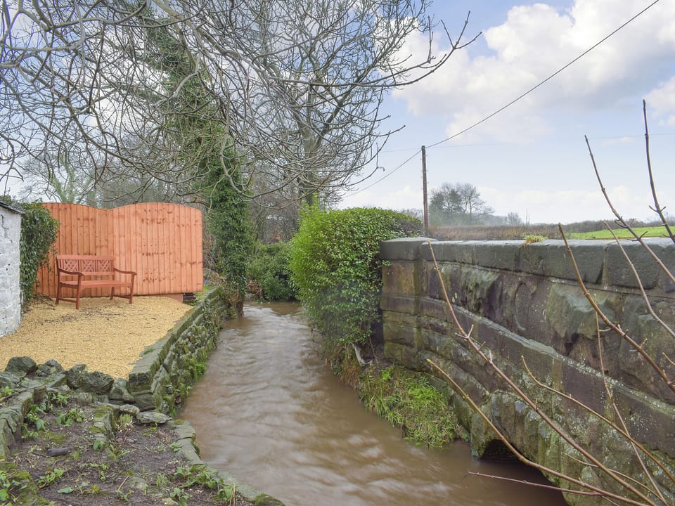 Sitting out area next to stream | Brookside Cottage, Forton, near Garstang