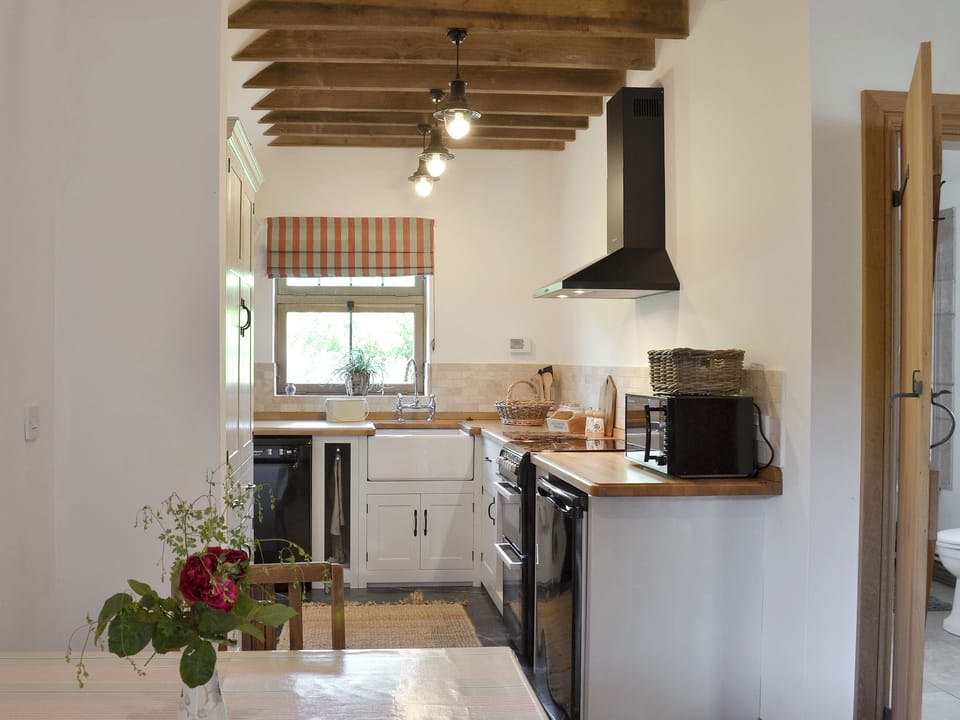 Well equipped kitchen/ dining area | Cowslip Cottage - Wildmore Cottages, New York, near Boston