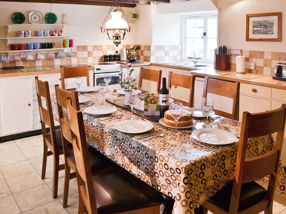 Tile-floored kitchen/diner with large table | Lynches, Parkham, near Bideford