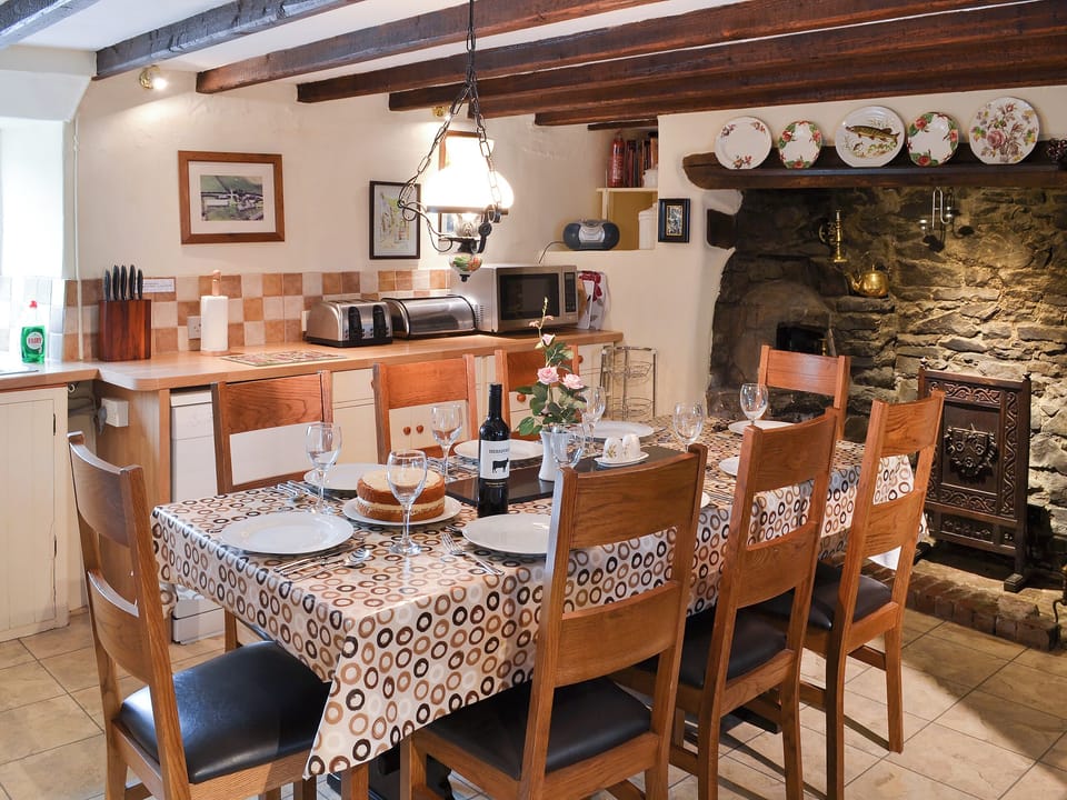 Kitchen/diner with beams and large fireplace | Lynches, Parkham, near Bideford