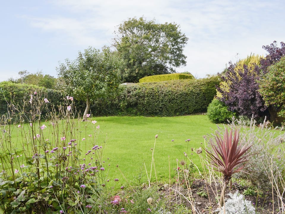 Well-maintained garden | Penhill Farm Cottage, Fremington, near Barnstaple