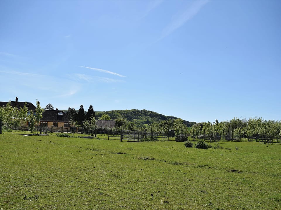 Setin glorious open countryside with Bredon Hill behind | The Lodge at Elmley Meadow, Elmley Castle, near Pershore