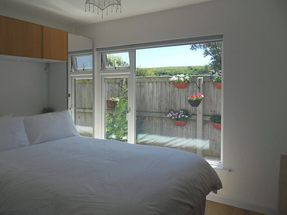 Comfortable double bedroom | Chalet One, Bridport