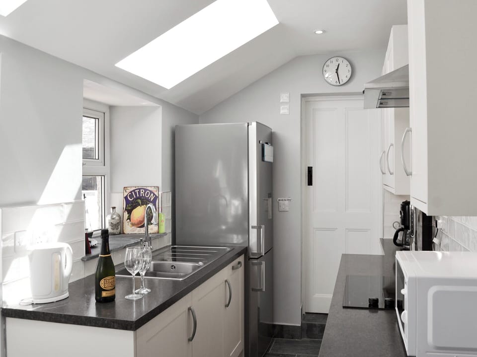 Well-equipped kitchen | Morvoren (Sea Maiden) Cottage, The Lizard Village, near Helston