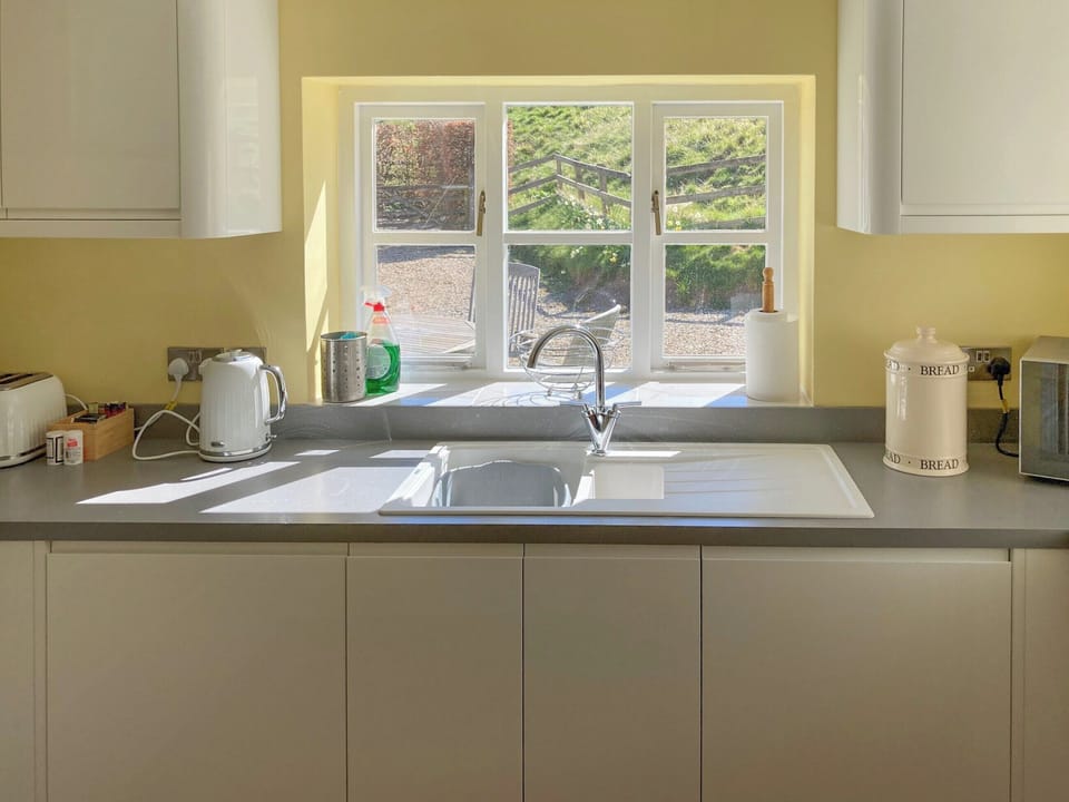 kitchen with garden views | Manor Cottage, Stiffkey, near Wells-next-the-Sea