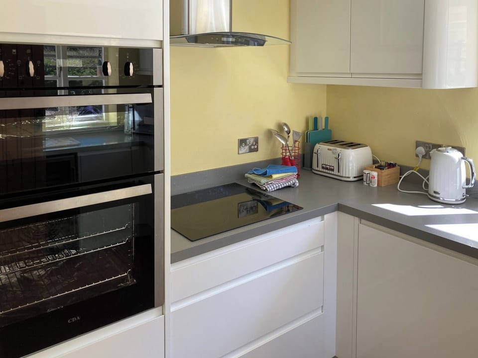 Fitted kitchen with built-in appliances | Manor Cottage, Stiffkey, near Wells-next-the-Sea