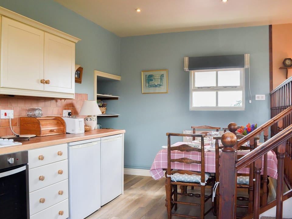 Steps down from the living area to the kitchen/diner | Bugatti House, Bosbury, near Ledbury
