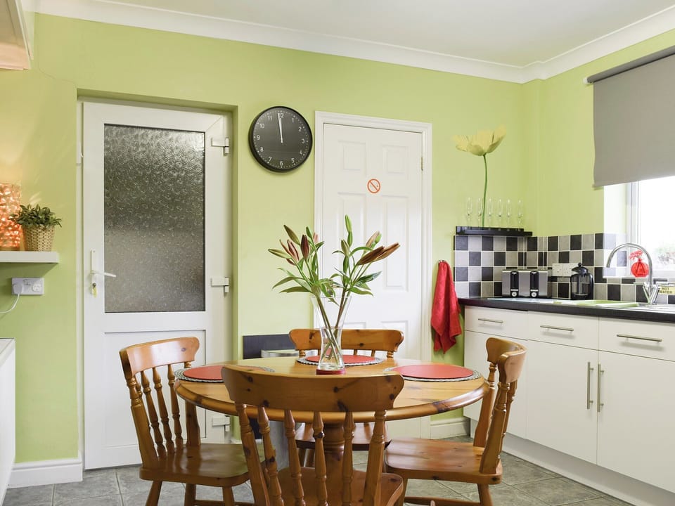 Spacious dining area within kitchen | Lena&rsquo;s Lodge, Camer&rsquo;s Green, Berrow, near Malvern