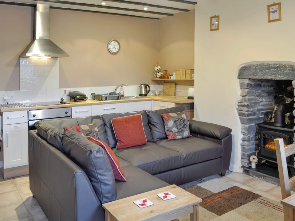 A well-equipped kitchen completes the open plan living space | Tan y Bryn, Prenteg, near Porthmadog