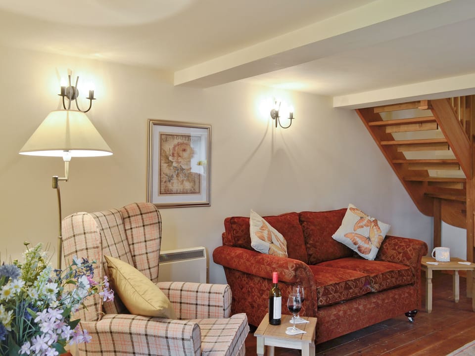 Comfy lounge with access to stairs to upper level | Bramble Cottage - Bramble Cottage and Honey Cottage, Newland, near Coleford