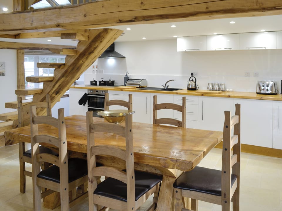 Convenient dining area | Combe View - Lower North Radworthy Cottages, Heasley Mill, near South Molton