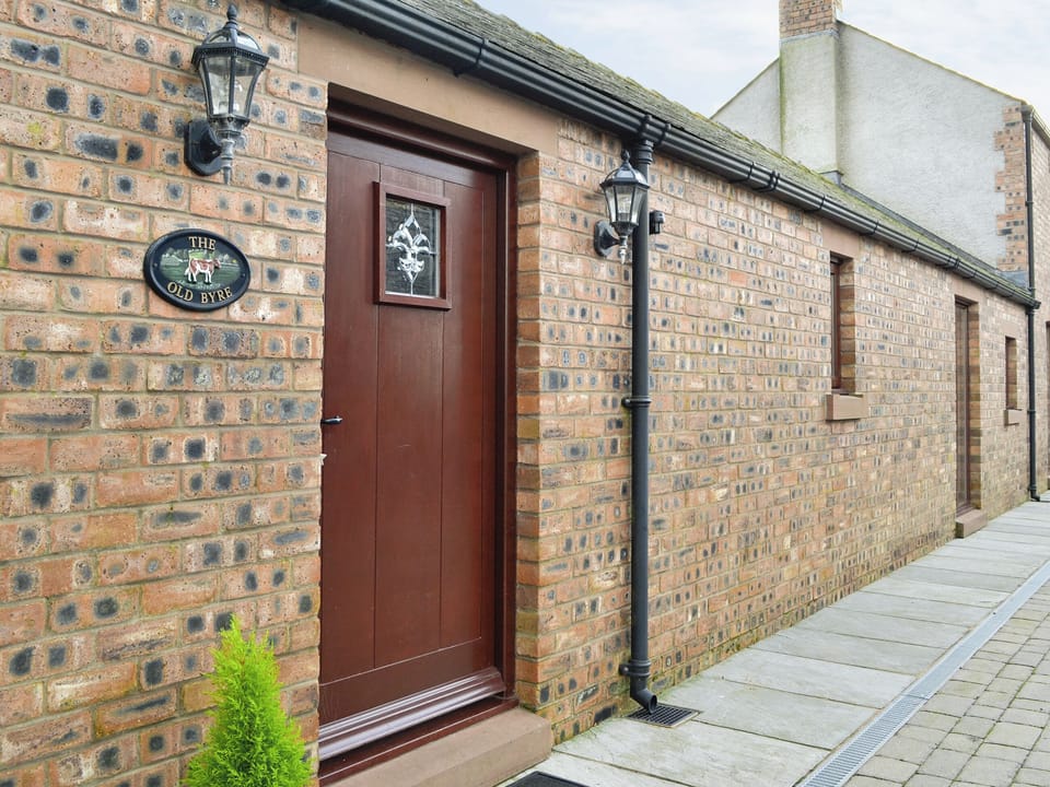Main entrance to the holiday property | The Old Byre - West House Farm, Dearham, near Maryport