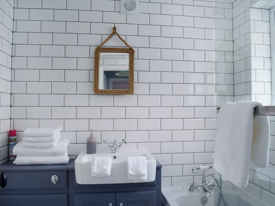Modern bathroom with shower over bath | Florence Cottage, Pakefield, near Lowestoft