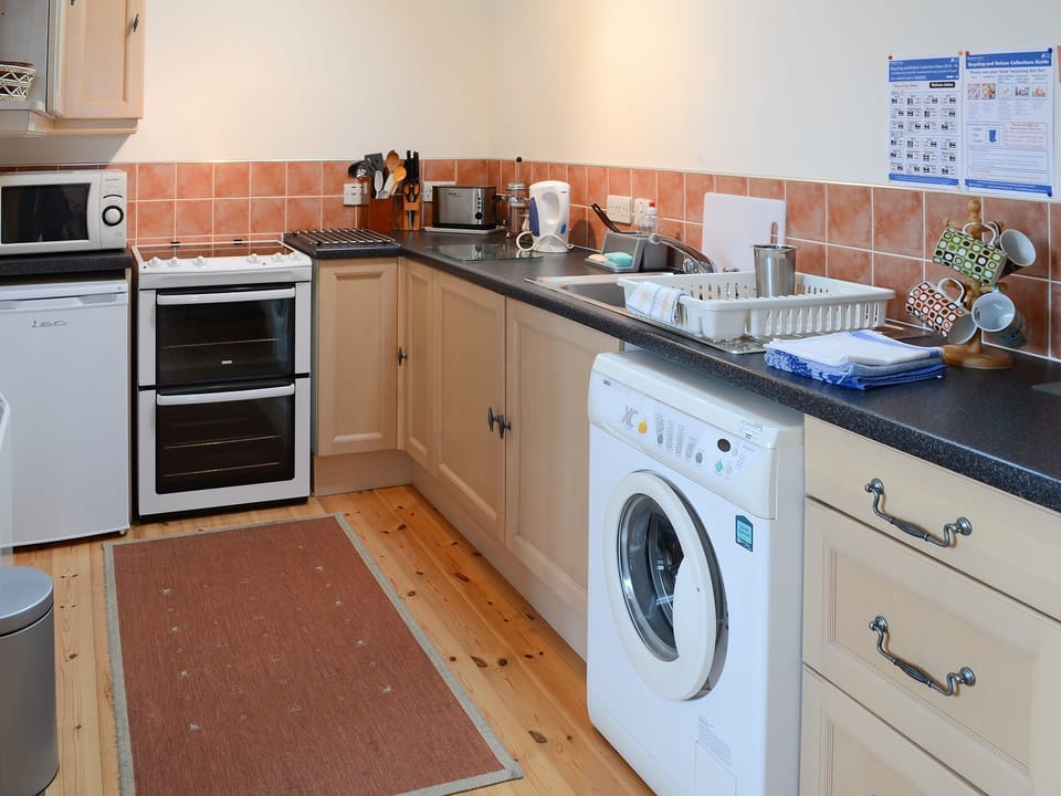 Delightful galley-style kitchen | Watermill Cottages - Watermill Cottages, John O&rsquo; Groats