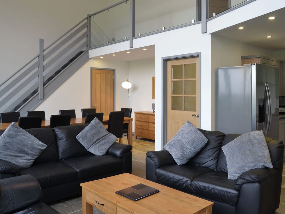 Welcoming open plan living space with wood burner and 65&rdquo; Freeview TV | Heartwell Cottage - Bowlees Holiday Cottages, Wolsingham, near Stanhope