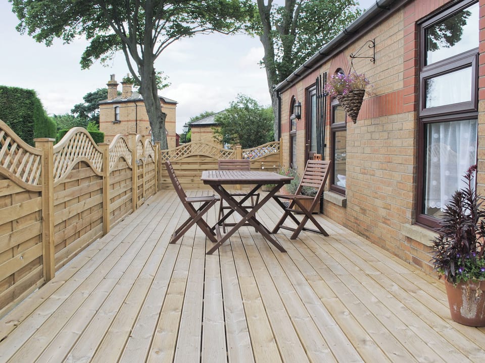Sitting-out-area | Eldin Hall Cottage Four, Cayton Bay, nr. Scarborough