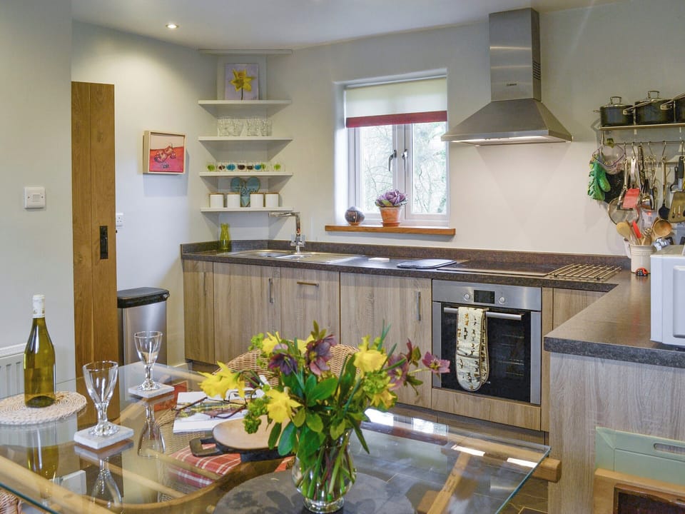 Well-equipped fitted kitchen with convenient dining area | Fisherman&rsquo;s CottageThe Nook, Dartmeet, near Yelverton