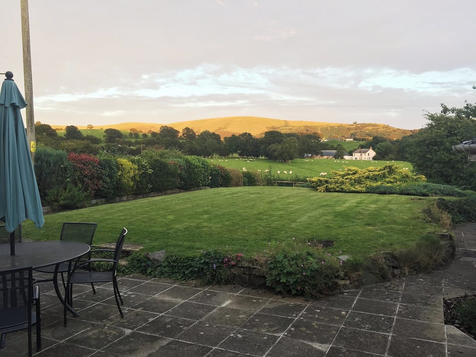 The patio and sitting out area make s great place to entertain outdoors | The Old Post Office, Myddfai, near Llandovery