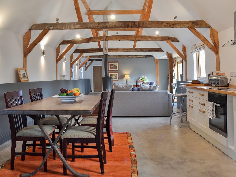 Dining area with exposed beams | Chiddock Cottage - Midgham Long Copse, Midgham, near Fordingbridge