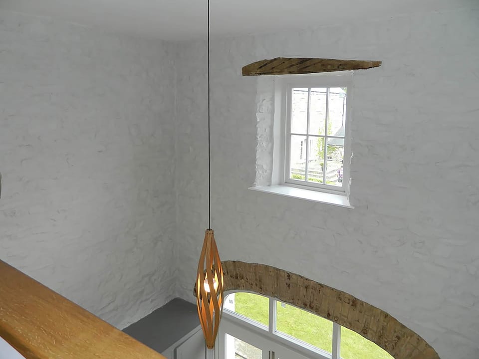 Light and airy stairwell with contemporary lighting | The Tower, Dreenhill, near Haverfordwest
