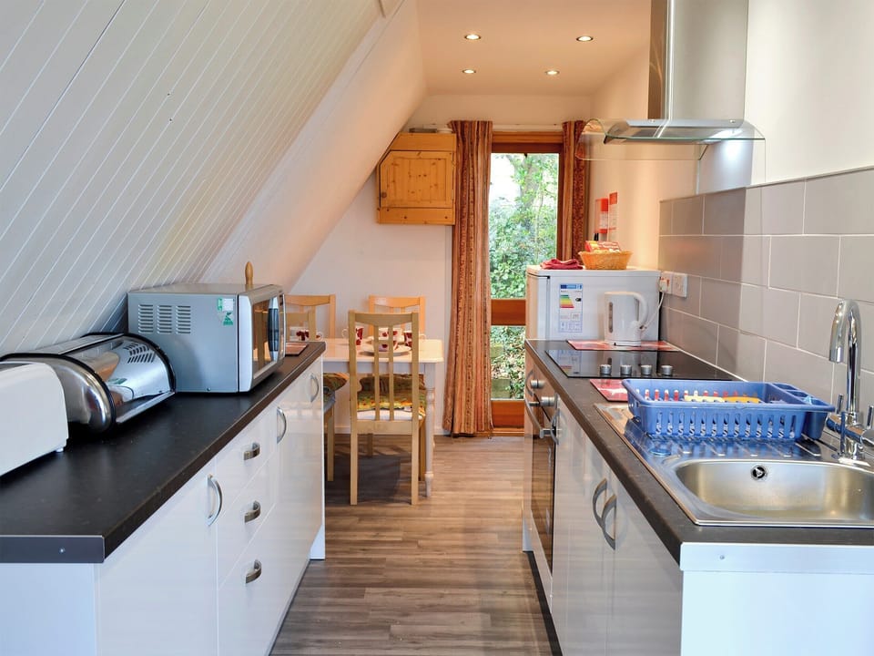 Galley style kitchen and dining area | Bay View, Kingsdown, near Deal