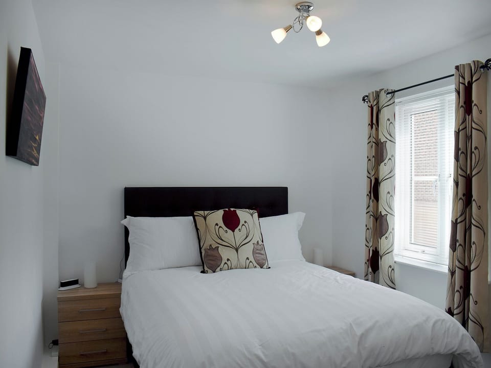 Comfortable double bedroom with kingsize bed | Tidal Retreat, Whitby