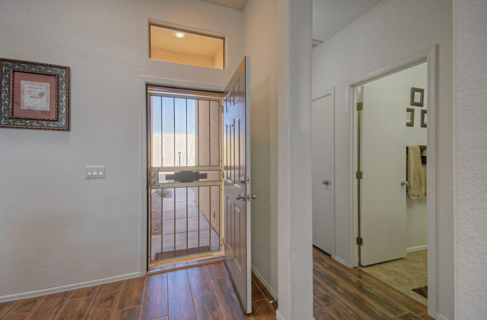 Entrance foyer into newly decorated patio home that's perfect for two couples or a family.