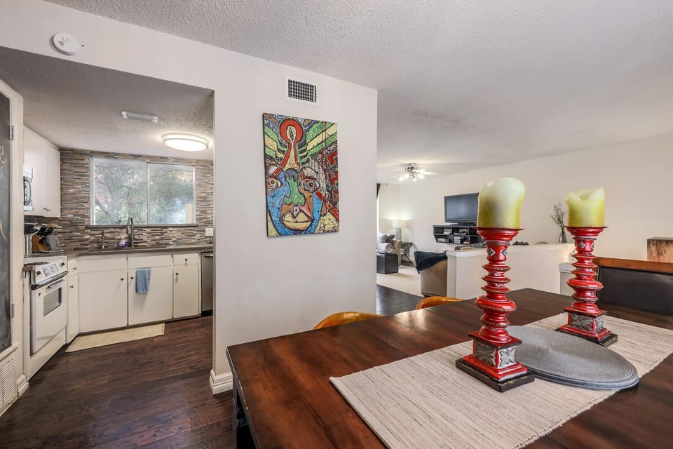 View of kitchen, dining and living room