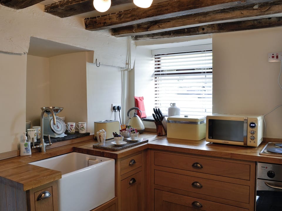 Kitchen with Belfast sink | Maybill Cottage, Cwm Penmachno, near Betws-y-Coed