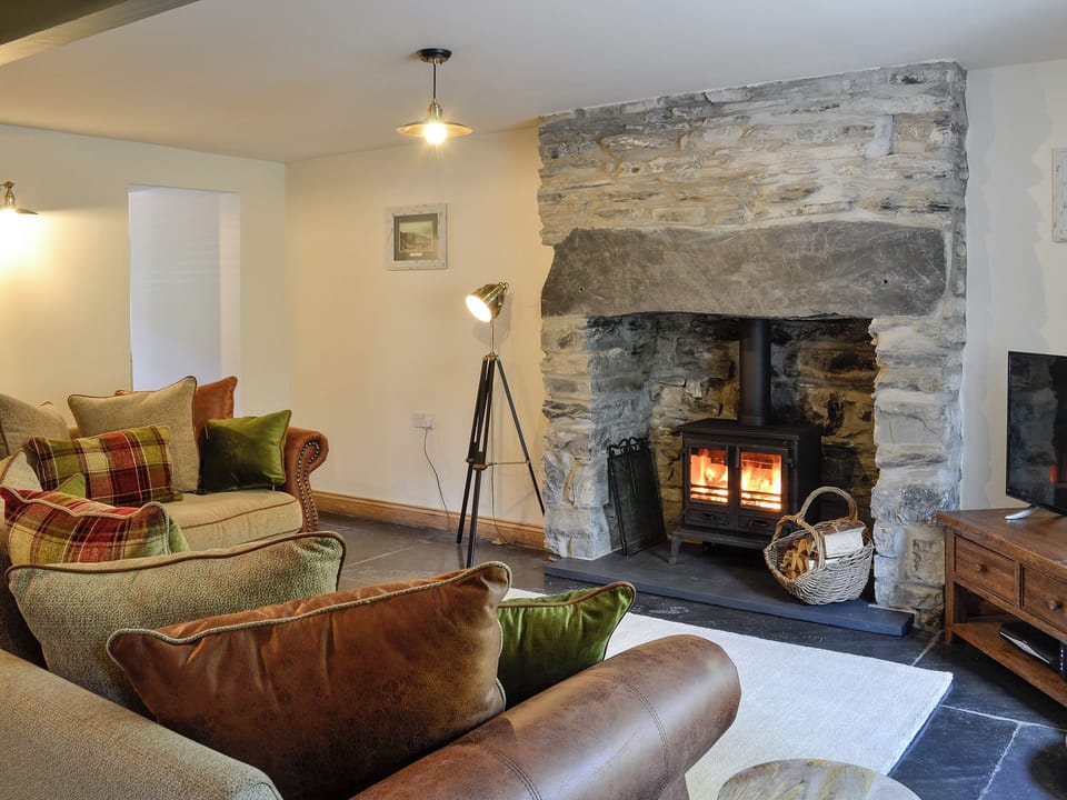 Cosy living room with Wood burning stove | Maybill Cottage, Cwm Penmachno, near Betws-y-Coed