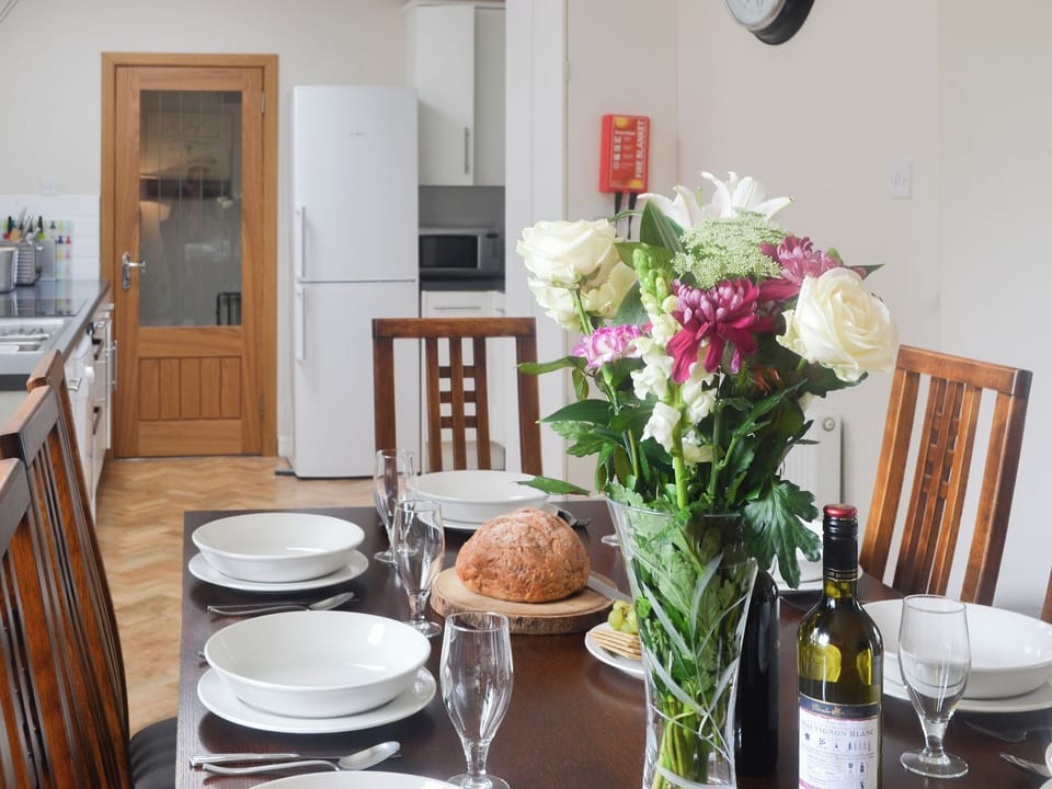 Impressive dining area and adjacent kitchen | Loramore, Aviemore