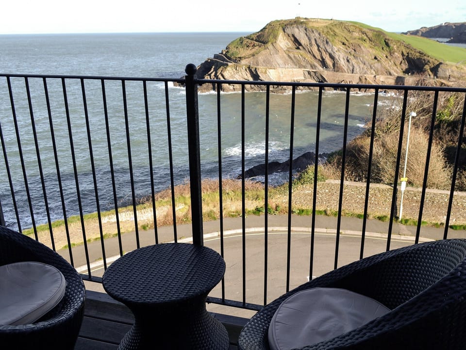 Balcony with seating area overlooking the sea | Apartment 6, Ilfracombe