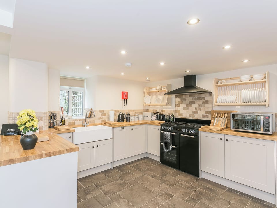 Large farmhouse style kitchen | Manor Cottage, Wardlow, near Buxton