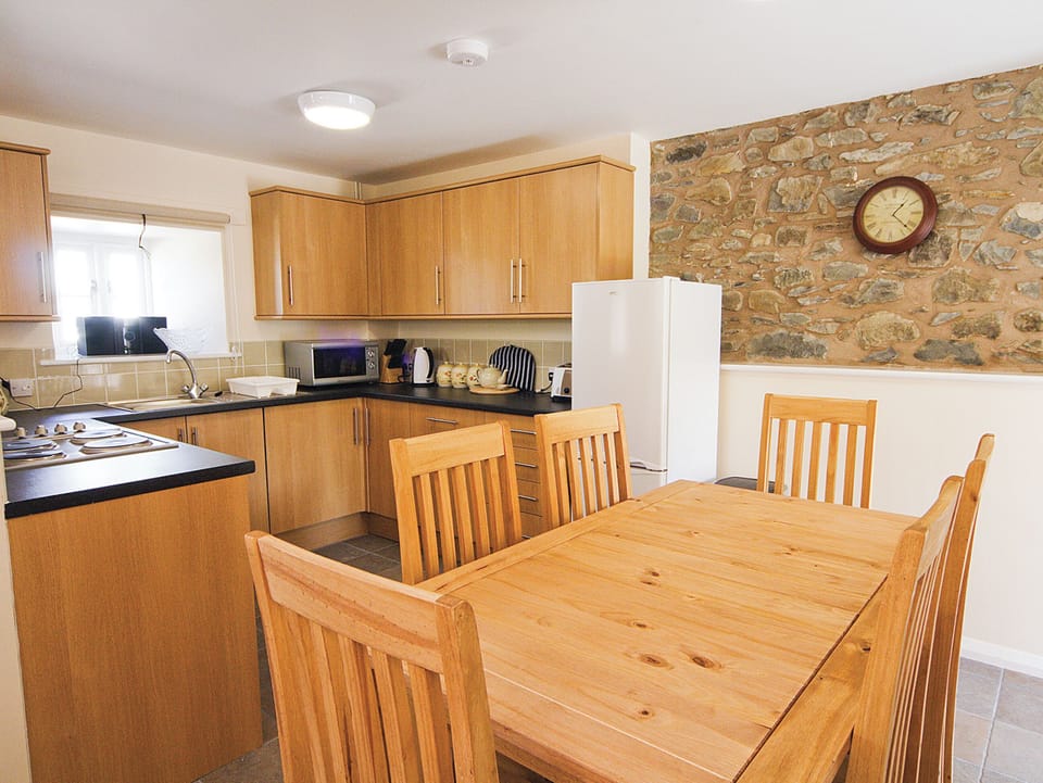 Smithy Barn dining and kitchen area | Smithy Barn, Betws-Yn-Rhos, Conwy