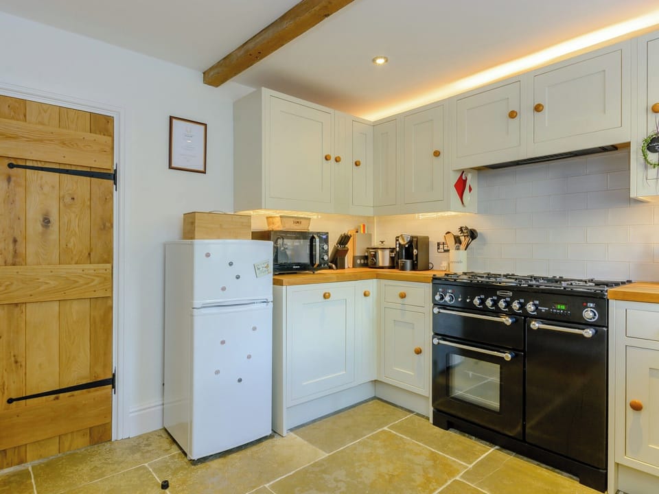 Well-equipped fitted kitchen | Whibberley Cottage, Ashford-in-the-Water, near Bakewell