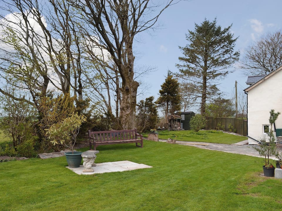 Garden mainly laid to lawn with seating | Bryntrisant, Devil&rsquo;s Bridge, near Aberystwyth
