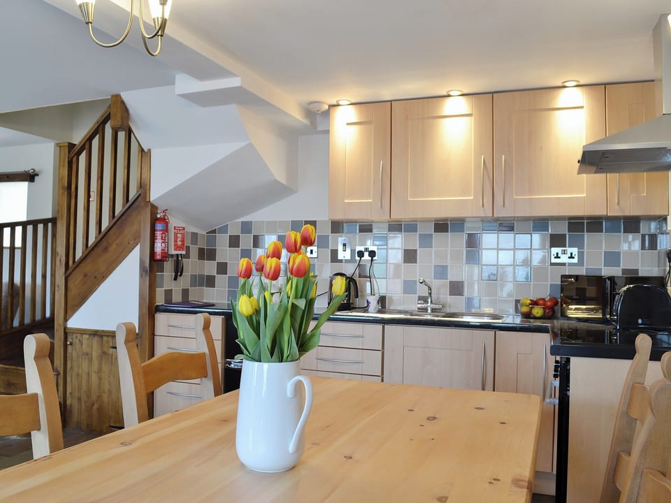Traditional farmhouse style kitchen/dining area | Bryntrisant, Devil&rsquo;s Bridge, near Aberystwyth