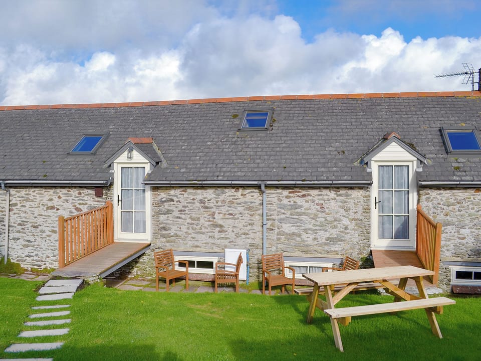 Beautiful barn conversion, reached via small bridges to upper floor | The Shippen, East Prawle