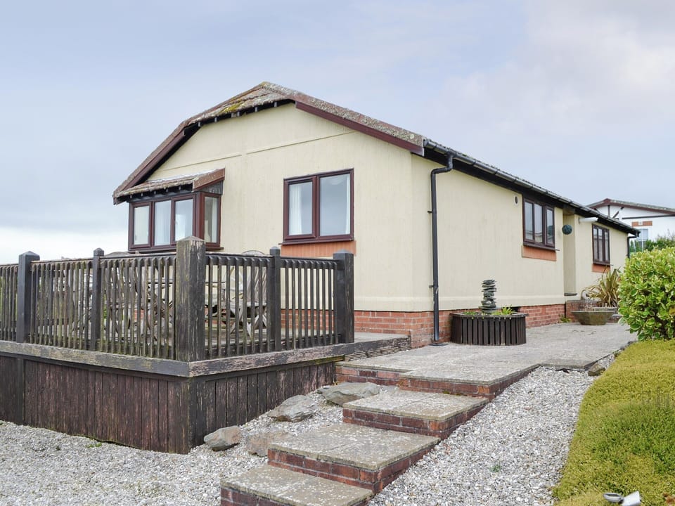 Attractive holiday home with raised terrace | Driftwood, St. Merryn, near Padstow