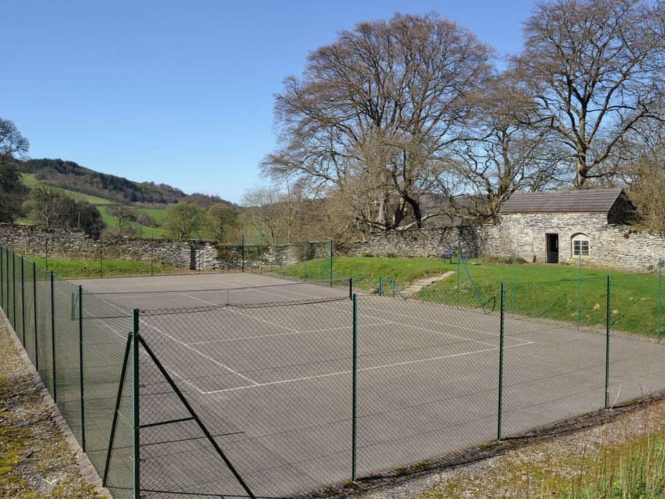 Full sized enclosed tennis court | Crogen Wing, Bala