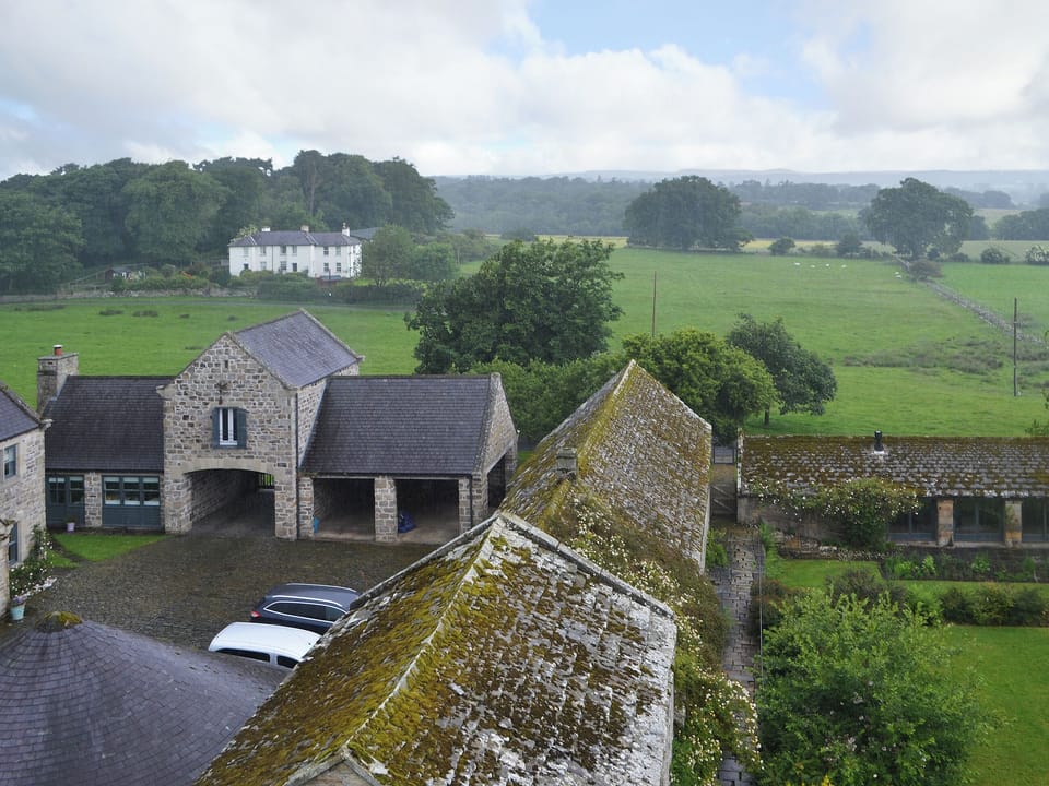 This quirky property is situated atop the gatehouse | The Gatehouse - Bitchfield Tower Cottages, Belsay