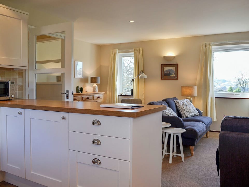Kitchen/dining area with breakfast bar | Melbreak, High Lorton, near Cockermouth