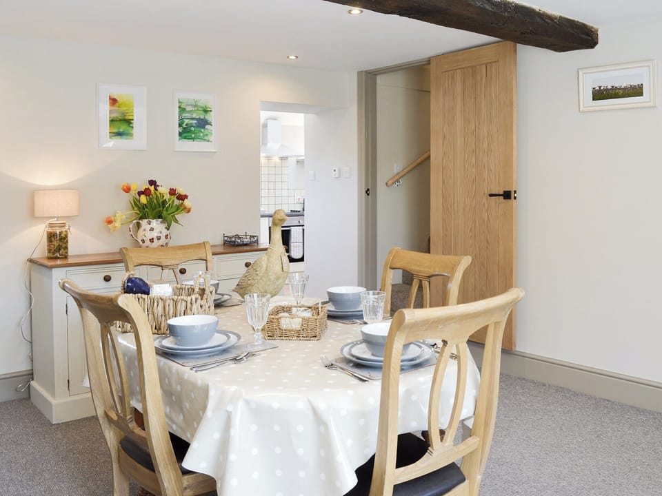 Conveniently situated dining room | Blackcurrant Cottage at Stanton Ford Farm, Baslow, near Bakewell