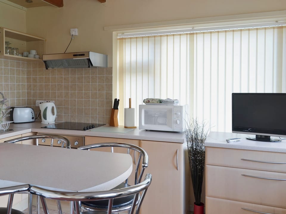 Kitchen and dining area | Flat F1, Dawlish Warren