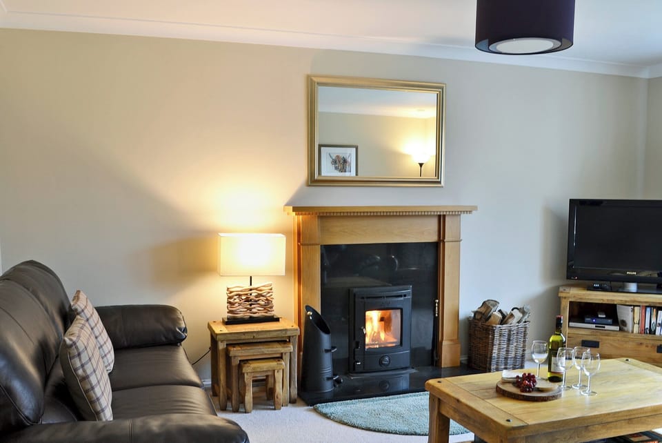 Warm and welcoming living room | Stags Neuk, Aviemore